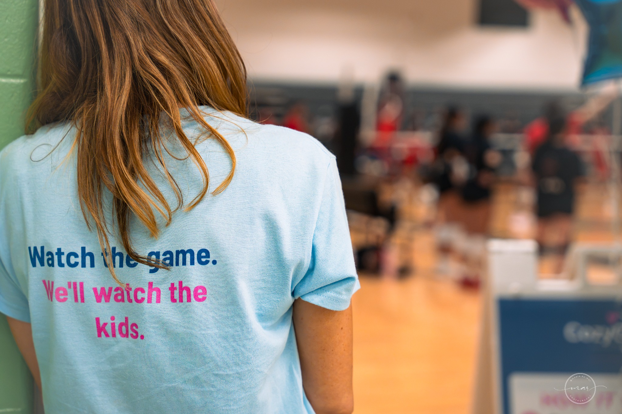 CozyCrew team member at an indoor sports tournament